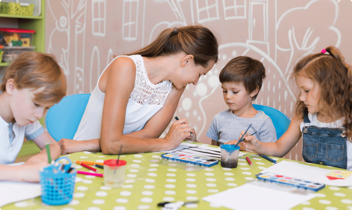 ZoniLive teacher painting in an offline classroom to teach kids creative skills